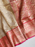 Gold Tissue Banarasi saree with a red border