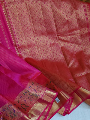 Kanjeevaram in a beautiful shade of majenta with a woven paithani styled border