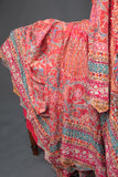 Designer Georgette Saree in hues of orange, peach, red and pink