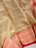 Gold Tissue Banarasi saree with a red border
