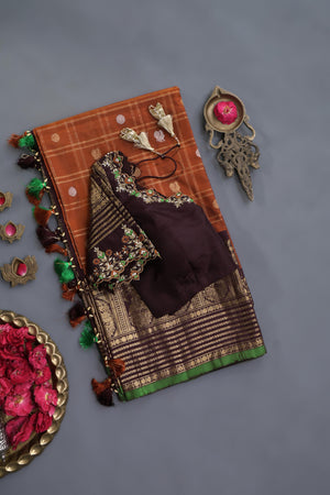 Rich kanjeevaram saree in rust orange and brown border