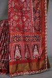 Patan Patola saree with intricately designed maggam work border