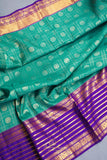 Pure Kanjeevaram saree in green & purple
