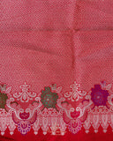 Pink Banarasi kora with a beautiful contrast red meenakari floral border
