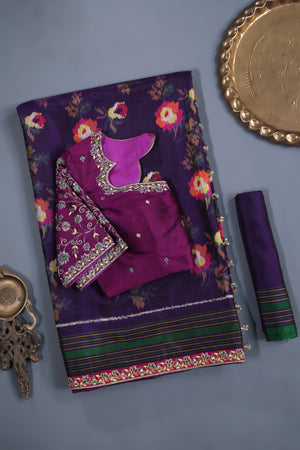 A classic patola in purple with a striking border