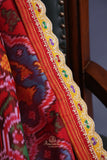 Patan Patola saree with intricately designed maggam work border