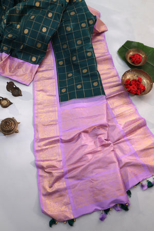 Gadwal pattu saree in the most beautiful dark green and lavender combo