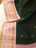 Kanjeevaram saree in bottle green with a baby pink border