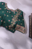 Raw Mango saree in bubble gum pink paired with a contrast dark green blouse