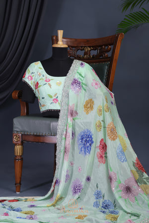 Mint Green Crepe Floral saree with hand worked border