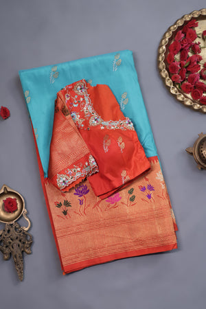 Aqua blue Gadwal saree with meenakari floral border in orange