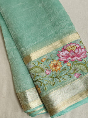 Sea Green Crush Tissue saree with a beautiful floral embroidered border