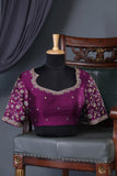 A classic patola in purple with a striking border