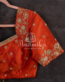 Orange Tusser Georgette saree with all over floral and paithani weave