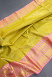 A dreamy kanjeevaram saree in a pastel lime shade