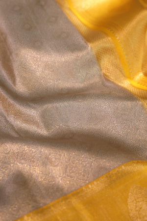 Kanjeevaram Tissue saree in silver and yellow