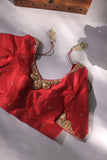 A stunning jewelry work blouse in red