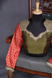 Bandini Gharchola in a lovely olive green shade with kalamkari pallu