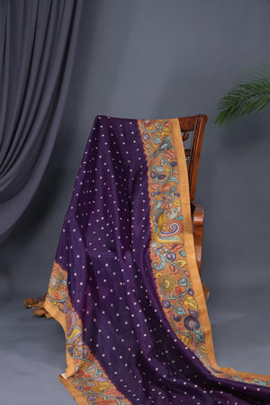 Deep purple bandini saree with a hand painted kalamkari border