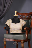 Stunning cocktail saree in champagne gold color