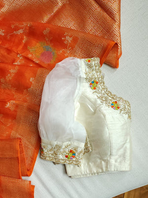 Deep Orange Munga silk saree with contrast off white puff sleeves blouse