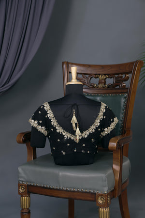 Elegant Tissue Organza saree in black and gold