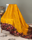 Yellow pure silk saree with contrast brown floral cutwork border