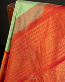 Gadwal Pattu saree in mint green and orange combo