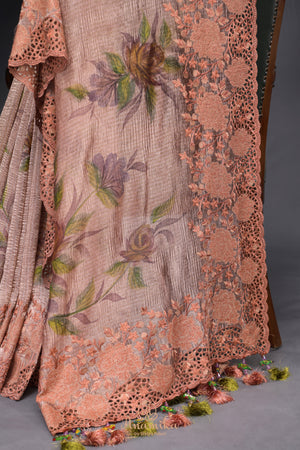 Crushed tissue saree in peach with beautiful cutwork border