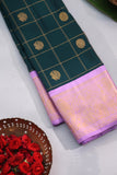 Gadwal pattu saree in the most beautiful dark green and lavender combo