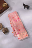 Muslin jamdaani in peach paired with a contrast mint green paithani blouse