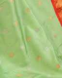 Gadwal Pattu saree in mint green and orange combo