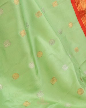 Gadwal Pattu saree in mint green and orange combo