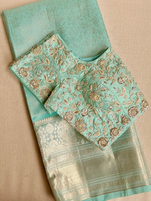 Light Blue kanjeevaram saree with a heavy embroidered blouse