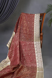 Tmeless kanjeevaram in a maroon shade