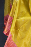A dreamy kanjeevaram saree in a pastel lime shade