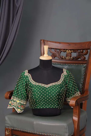 Dark green blouse with heavy embroidery work