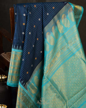 Timeless Gadwal Pattu saree in deep navy and teal blue
