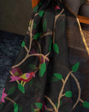 Muslin jamdaani saree in black with all over floral weave