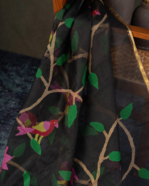 Muslin jamdaani saree in black with all over floral weave