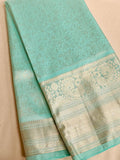 Light Blue kanjeevaram saree with a heavy embroidered blouse