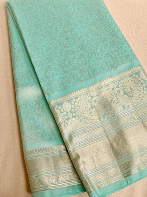 Light Blue kanjeevaram saree with a heavy embroidered blouse