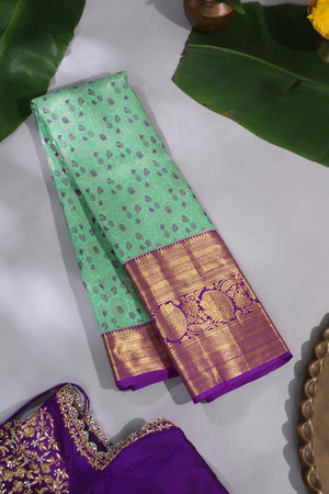 Mint Green Kanjeevaram saree with a purple border