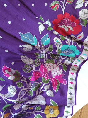 Tusser georgette saree in purple with all over floral weave and paired with pure paithani blouse