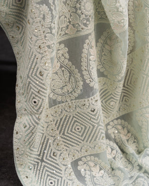 Chikankari georgette saree in light powder blue with beautifully woven sequins