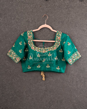Green Elbow sleeves blouse with multi color thread and zari work