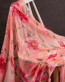 A floral chiffon georgette saree in light pink paired with a simple pink mirror work blouse