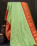 Gadwal Pattu saree in mint green and orange combo