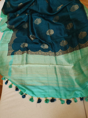 Peacock Green with aqua blue rawsilk saree with a stylish blouse