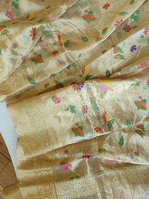 Banarasi Tissue saree in gold with all over floral motifs